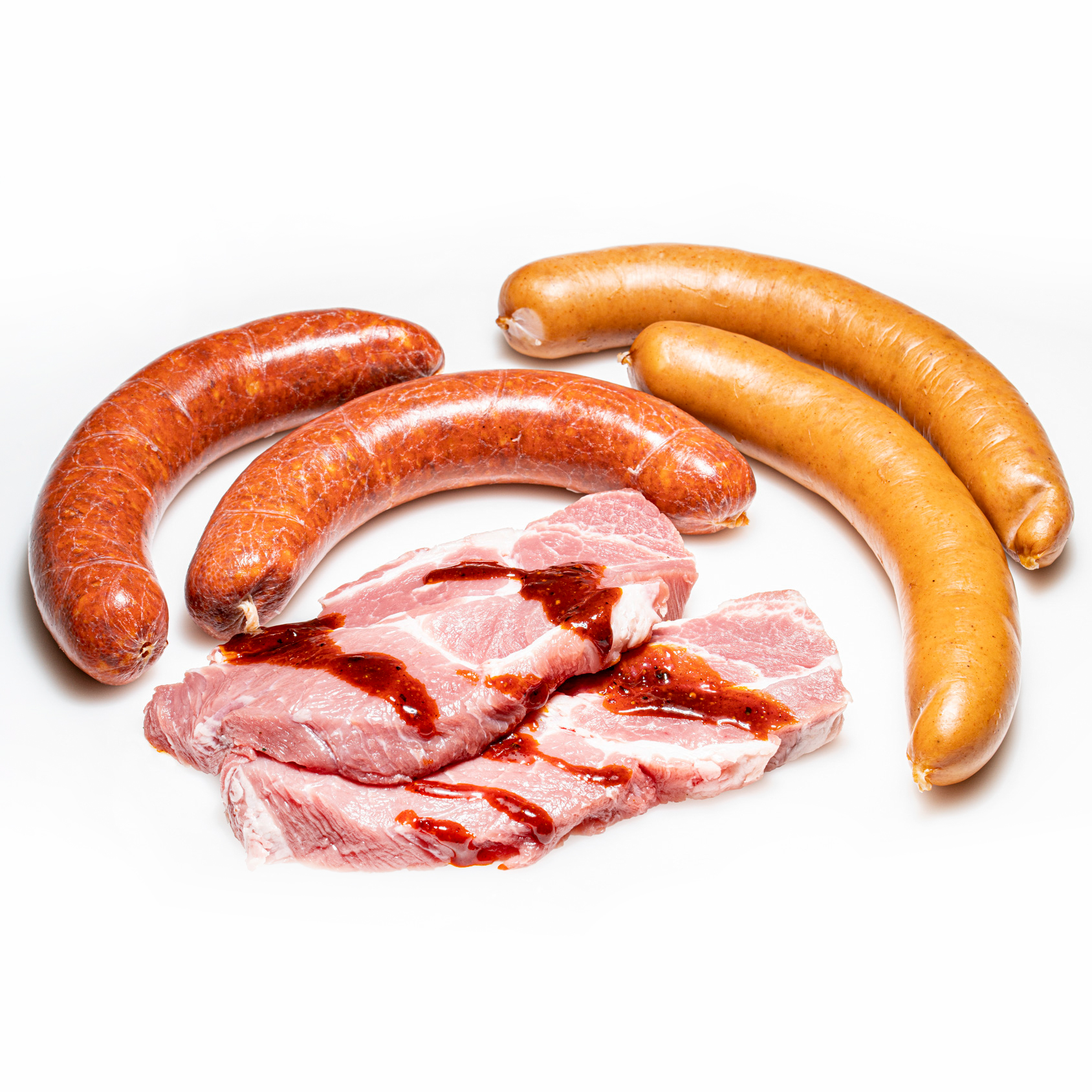 Grillpaket pikant mit Kolbasz, Käse-Griller und Schweinekammsteaks