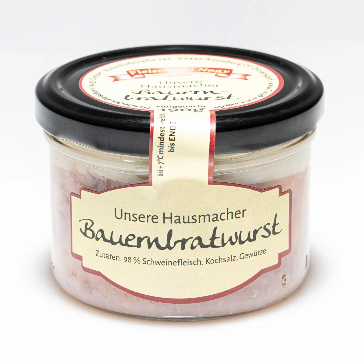 Hausmacher Bauernbratwurst im Glas auf weißem Hintergrund.