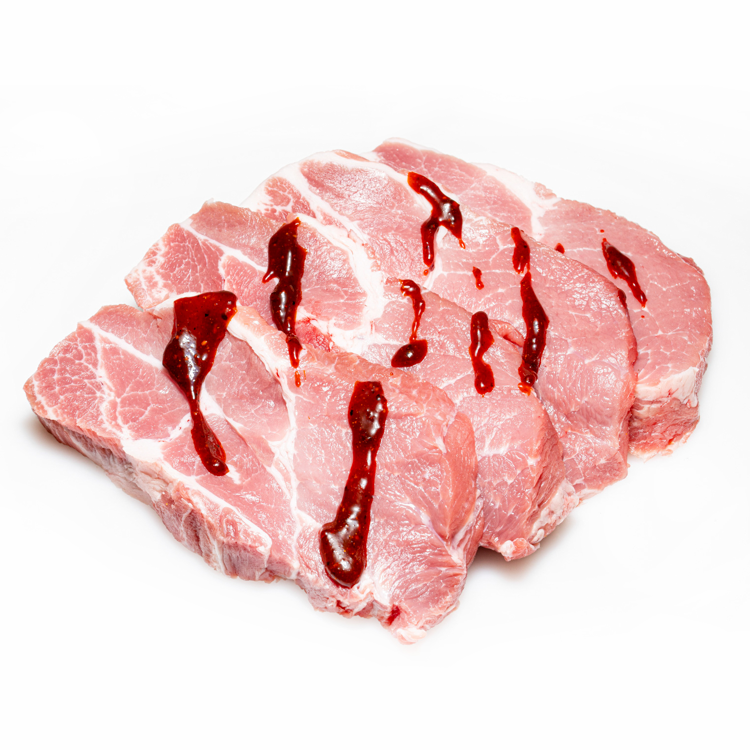 Schweinekammsteaks mit Tomaten-Pfeffer-Marinade fuer den Grill kaufen