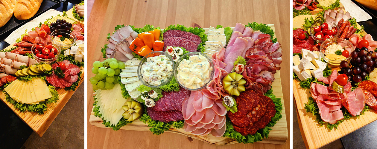 Holzbrett mit verschiedenen Brotbelägen